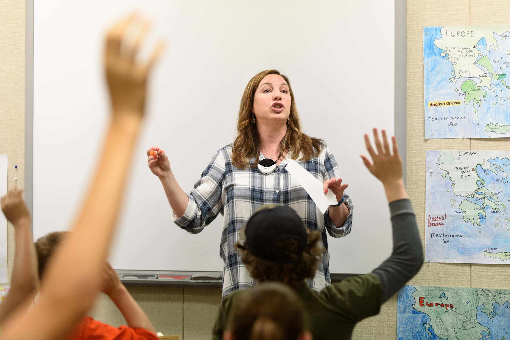 Teacher with FrontRow at front of class